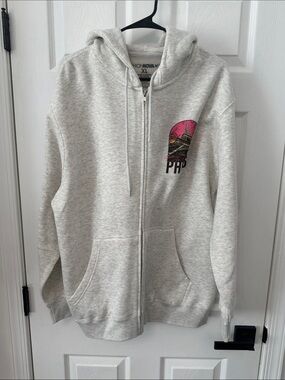 Light Gray Zip-Up Hoodie with Pink Graphic